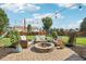 An outdoor fire pit and ample seating make this backyard a relaxation destination at 6622 W Dickens Xing, McCordsville, IN 46055