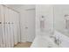 The bathroom features a bright white vanity and neutral accents at 6622 W Dickens Xing, McCordsville, IN 46055