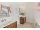 The bathroom features a double vanity, bright light, and neutral accents at 6622 W Dickens Xing, McCordsville, IN 46055