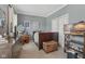 Bedroom featuring a bed, dresser, and decorative wall art at 6622 W Dickens Xing, McCordsville, IN 46055