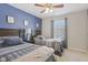 Serene bedroom showcasing two twin beds, a calming color palette, and a window for natural light at 6622 W Dickens Xing, McCordsville, IN 46055