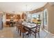 Bright dining room features a sliding glass door to the backyard and an adjacent kitchen at 6622 W Dickens Xing, McCordsville, IN 46055