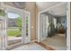 Bright and airy entryway featuring a view to the study, neutral tones, and stylish decor at 6622 W Dickens Xing, McCordsville, IN 46055