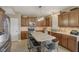 Kitchen featuring granite countertops and stainless steel appliances and lighting at 6622 W Dickens Xing, McCordsville, IN 46055