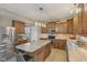 Kitchen with stainless steel appliances, granite countertops and eating bar with seating at 6622 W Dickens Xing, McCordsville, IN 46055