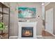 A fireplace adds warmth and style to this inviting living room, with decor giving ocean vibes at 6622 W Dickens Xing, McCordsville, IN 46055