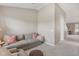 Cozy living room with comfortable seating, soft lighting, and neutral colors at 6622 W Dickens Xing, McCordsville, IN 46055