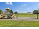 Community playground featuring play structures, swings, and open spaces at 6622 W Dickens Xing, McCordsville, IN 46055