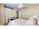 Bright and spacious bedroom featuring a comfortable bed, ceiling fan, and natural light, with cozy and inviting features at 6816 Minnow Dr, Indianapolis, IN 46237