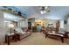 Spacious living room featuring comfortable seating, natural light, and open layout at 6816 Minnow Dr, Indianapolis, IN 46237
