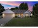 Charming ranch home with brick facade, attached garage, and beautifully maintained lawn at 770 Viewpoint Dr, Plainfield, IN 46168
