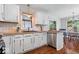 Bright kitchen featuring stainless steel appliances, ample cabinet space, and a view into the dining area at 770 Viewpoint Dr, Plainfield, IN 46168