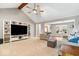 Spacious living room with vaulted ceiling, built-in shelving, and plenty of natural light at 770 Viewpoint Dr, Plainfield, IN 46168