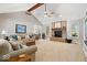 Cozy living room featuring a brick fireplace, large windows, and comfortable seating at 770 Viewpoint Dr, Plainfield, IN 46168