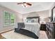 Spacious main bedroom with a large bed, elegant decor, and plenty of natural light at 770 Viewpoint Dr, Plainfield, IN 46168