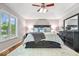 Spacious main bedroom with a large bed, elegant decor, and plenty of natural light at 770 Viewpoint Dr, Plainfield, IN 46168