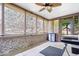 The screened porch features brick accents, and ample natural light at 770 Viewpoint Dr, Plainfield, IN 46168