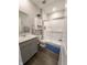 Well-lit bathroom with a modern vanity, toilet, and glass-enclosed shower, creating a clean and functional space at 7808 Grande Oaks Dr, Plainfield, IN 46168