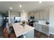 Bright kitchen featuring stainless appliances, a center island with seating, and modern cabinetry at 7808 Grande Oaks Dr, Plainfield, IN 46168