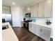 Kitchen with stainless steel appliances, sleek countertops, and ample cabinet space for storage at 7808 Grande Oaks Dr, Plainfield, IN 46168