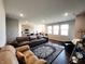 Open concept living room and kitchen great for entertaining with lots of natural light at 7808 Grande Oaks Dr, Plainfield, IN 46168