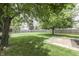 Large backyard provides an expansive lawn, bordered with privacy fence at 7914 Willow Wind Cir, Indianapolis, IN 46239