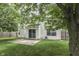 Home showcasing a nice backyard space with a patio and privacy fence at 7914 Willow Wind Cir, Indianapolis, IN 46239