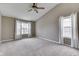 Bright and spacious bedroom featuring vaulted ceiling, neutral walls, and carpet flooring at 7914 Willow Wind Cir, Indianapolis, IN 46239