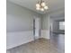 Dining room showcasing an open layout with modern flooring and neutral wall paint at 7914 Willow Wind Cir, Indianapolis, IN 46239