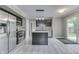 Beautiful kitchen with stainless appliances and an island with granite countertops at 7914 Willow Wind Cir, Indianapolis, IN 46239