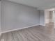 Open living room showcasing luxury vinyl plank flooring and neutral paint at 7914 Willow Wind Cir, Indianapolis, IN 46239