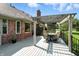 Spacious back deck features a dining area, pergola and a seating set with table and chairs at 8030 5 Points Rd, Indianapolis, IN 46259