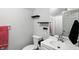 Clean bathroom with updated vanity, toilet, sink, mirror, and fixtures at 8030 5 Points Rd, Indianapolis, IN 46259