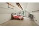 Cozy bedroom features natural light from a window and industrial style lighting at 8030 5 Points Rd, Indianapolis, IN 46259