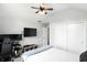 Bedroom with vaulted ceiling, neutral walls, carpet, and white closets at 8030 5 Points Rd, Indianapolis, IN 46259