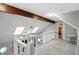 Spacious hallway with natural light from skylights provides access to other rooms in the home at 8030 5 Points Rd, Indianapolis, IN 46259