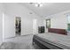 Bright bedroom boasts a walk-in closet and ensuite bathroom, offering ample storage and convenience at 9046 Sparta Dr, Fishers, IN 46038
