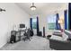 Bedroom with a desk, work area, loveseat, carpeted floor and natural light from the windows at 9046 Sparta Dr, Fishers, IN 46038