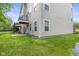 Exterior angle of home showing yard space, air conditioning unit, balcony and vinyl siding at 9046 Sparta Dr, Fishers, IN 46038