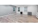 Spacious living room with modern floors, neutral walls, and ample natural light, perfect for relaxation at 9046 Sparta Dr, Fishers, IN 46038