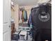 Walk-in closet with wire shelving and a Canada Goose bag on the carpeted floor at 9046 Sparta Dr, Fishers, IN 46038