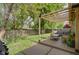 Relaxing backyard featuring a cozy deck with modern furniture, perfect for outdoor entertaining and relaxation at 9170 Andiron Way, Indianapolis, IN 46250