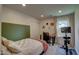 Bedroom with natural light, space for exercise, and closet storage at 9170 Andiron Way, Indianapolis, IN 46250