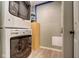 Practical laundry area with stacked washer and dryer, offering convenience and space-saving efficiency at 9170 Andiron Way, Indianapolis, IN 46250