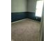 A cozy bedroom featuring fresh paint and neutral carpeting, complemented by a sunlit window at 922 Eagle Brook Dr, Shelbyville, IN 46176