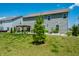 Large, grassy backyard showcasing a gazebo and tidy landscaping against a residential backdrop at 9407 Casey Rd, Pendleton, IN 46064