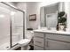 Modern bathroom featuring a glass-enclosed shower, white vanity, and sleek fixtures at 9407 Casey Rd, Pendleton, IN 46064