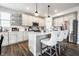 Well-appointed kitchen with white cabinetry, granite countertops, a center island, and stainless steel appliances at 9407 Casey Rd, Pendleton, IN 46064