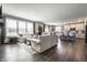 Open-concept living room with hardwood floors, comfortable seating, and seamless flow to the kitchen at 9407 Casey Rd, Pendleton, IN 46064
