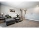 Inviting living room featuring a comfortable gray sectional sofa, stylish coffee table, and neutral decor at 9407 Casey Rd, Pendleton, IN 46064